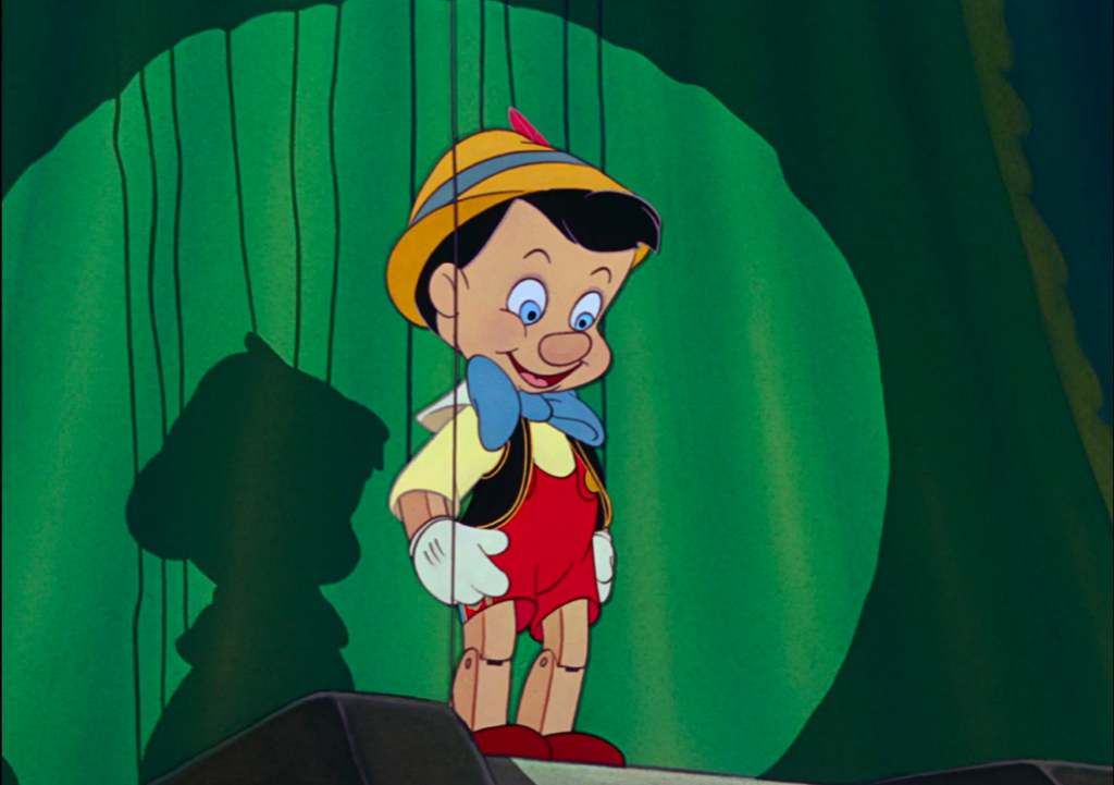Pinocchio in strings
