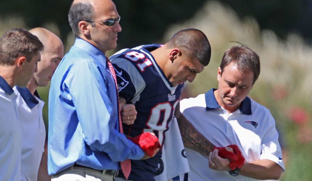 Aaron Hernandez being taken away following an injury in a game.