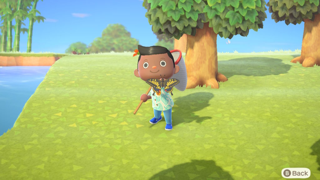 I caught a butterfly in Animal Crossing: New Horizons.