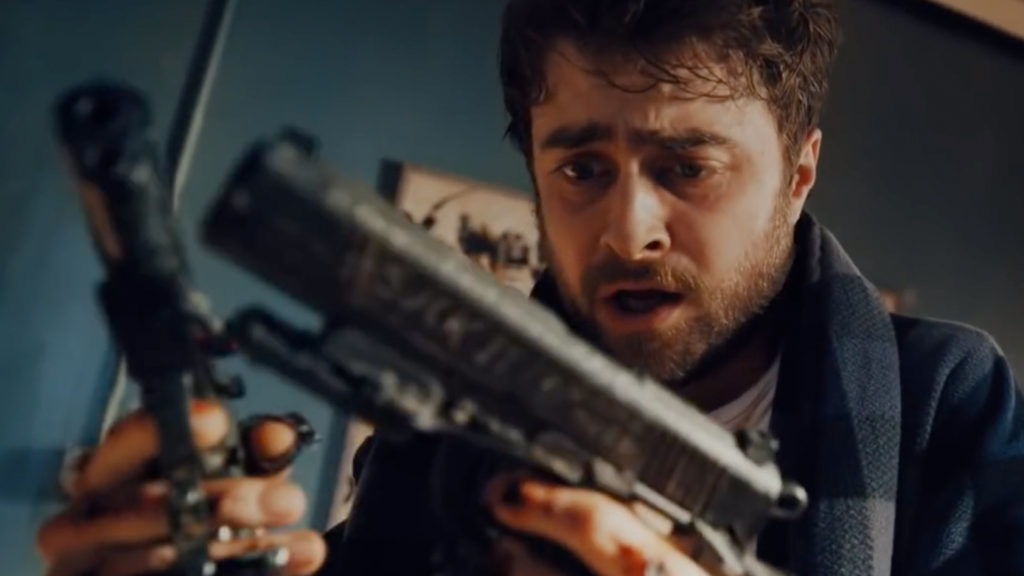 Daniel Radcliffe can't put on pants because he's got guns bolted to his hands in Guns Akimbo.