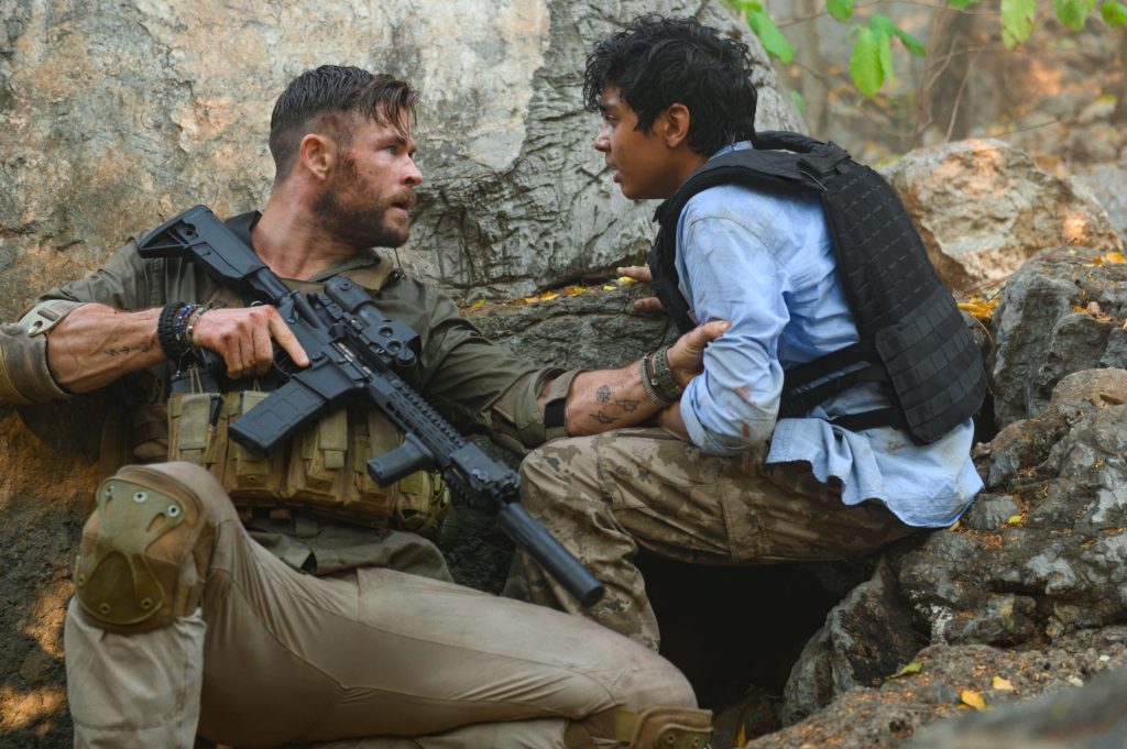 Chris Hemsworth and Rudhraksh Jaiswal in Netflix's Extraction.