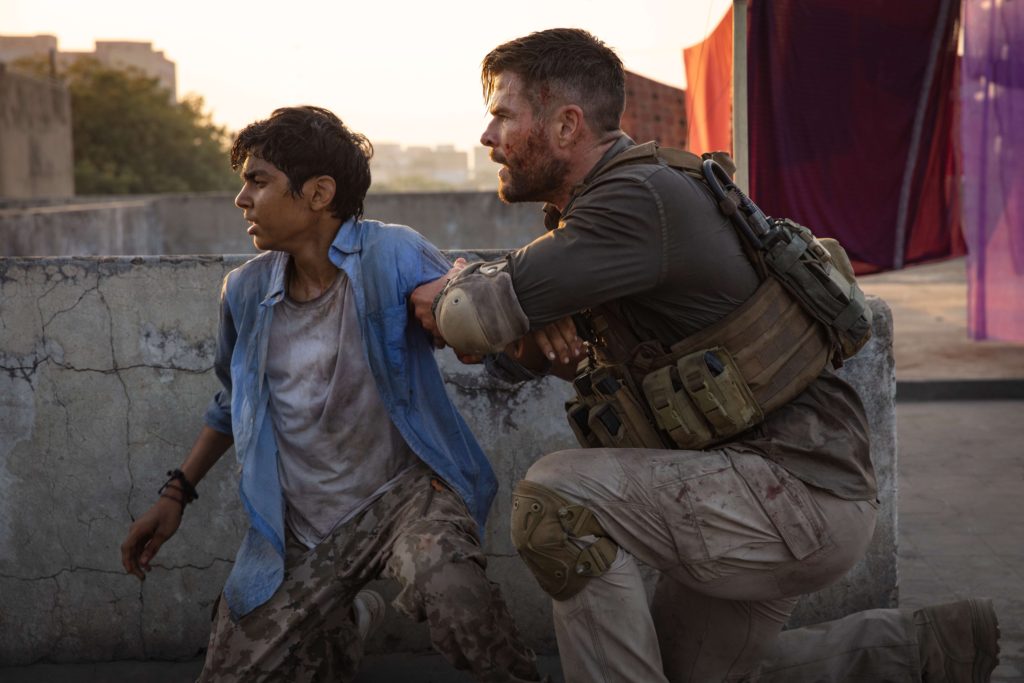 Chris Hemsworth and Rudhraksh Jaiswal in Netflix's Extraction.