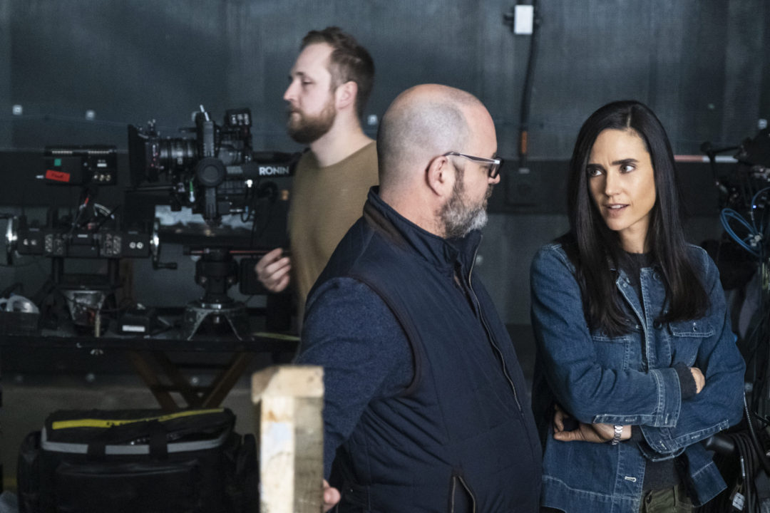 Graeme Manson and Jennifer Connelly on the set of Snowpiercer
