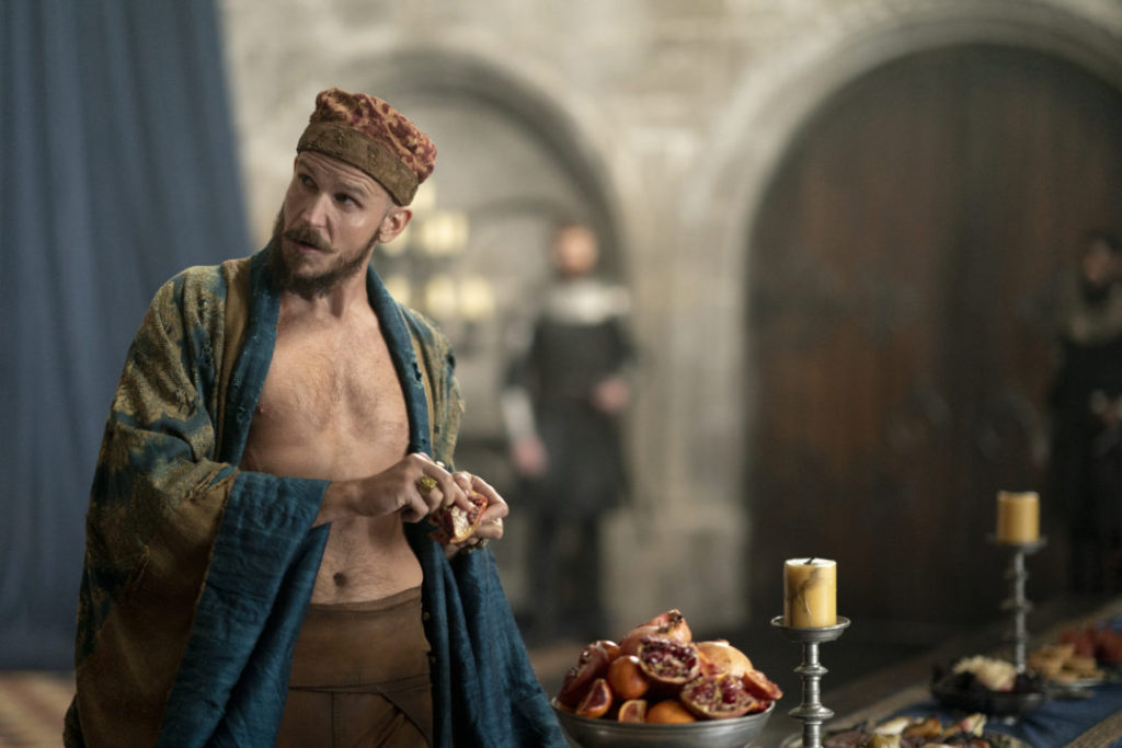 Gustaf Skarsgård is Merlin in Netflix's Cursed.