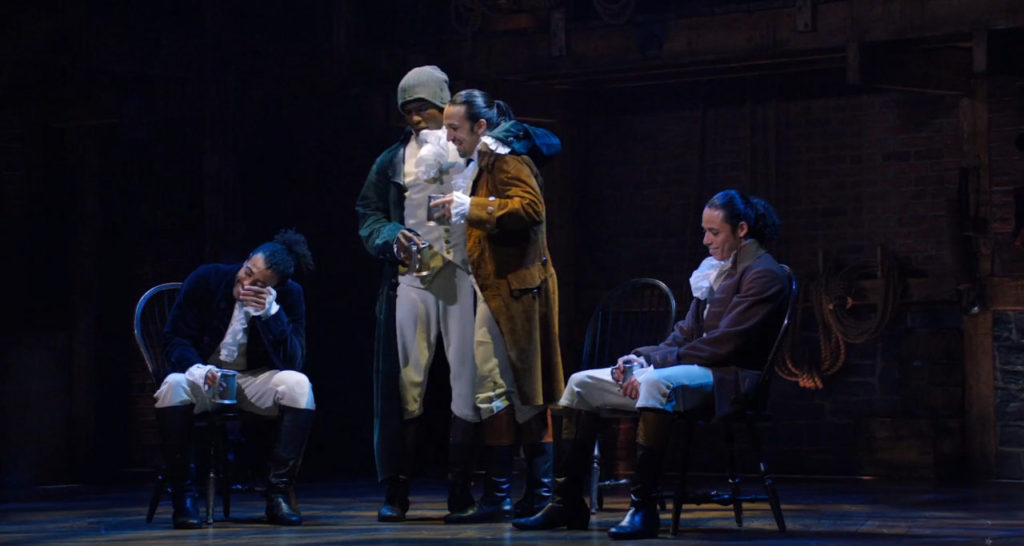 Lafayette, Hercules Mulligan, Hamilton and Lawrence have a drink in Hamilton.