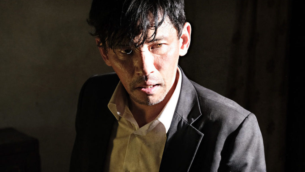 Hwang Jung-min plays the hired killer In-Nam in Deliver Us from Evil.