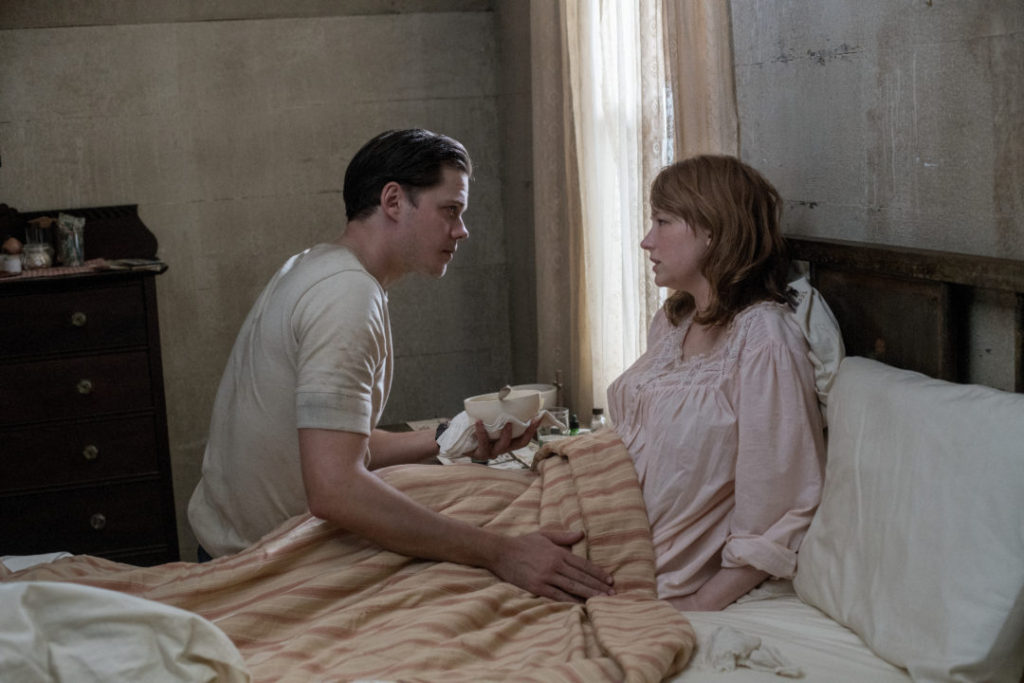 Bill Skarsgård and Haley Bennett as  Willard and Charlotte Russell in The Devil All the Time.