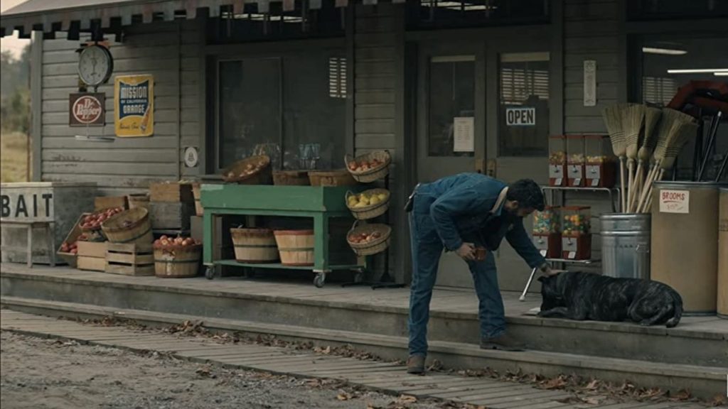 In Midnight Mass, Rahul Kohli as Sheriff Hassan pets Pike, the dog of one of the townsfolk.