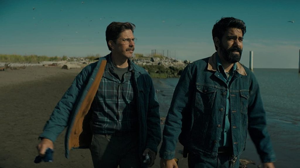 Michael Trucco as Mayor Wade and Rahul Kohli as Sheriff Hassan in Midnight Mass.