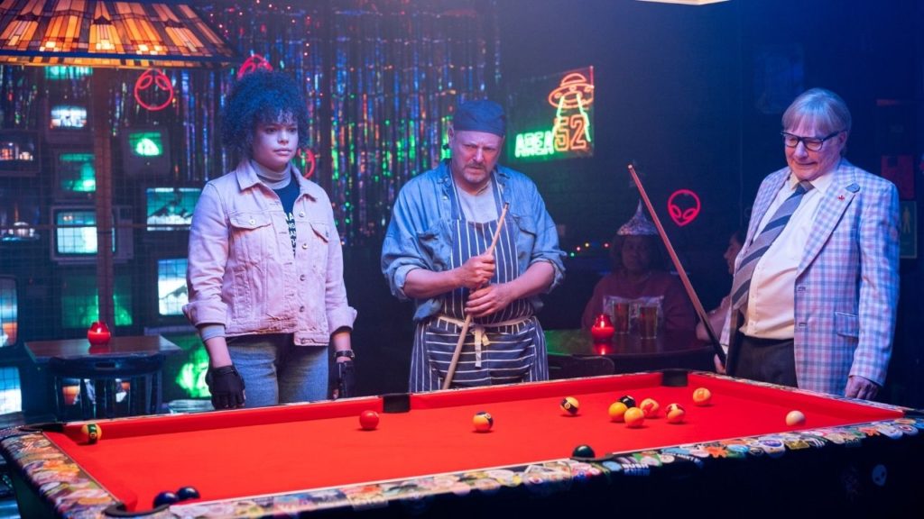 Mike Myers playing pool in The Pentaverate.